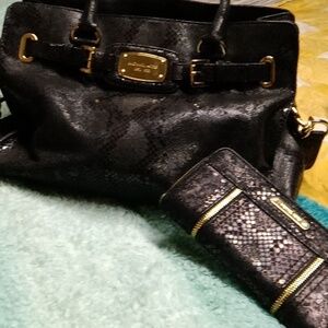 Pocketbook and wallet Micheal Kors